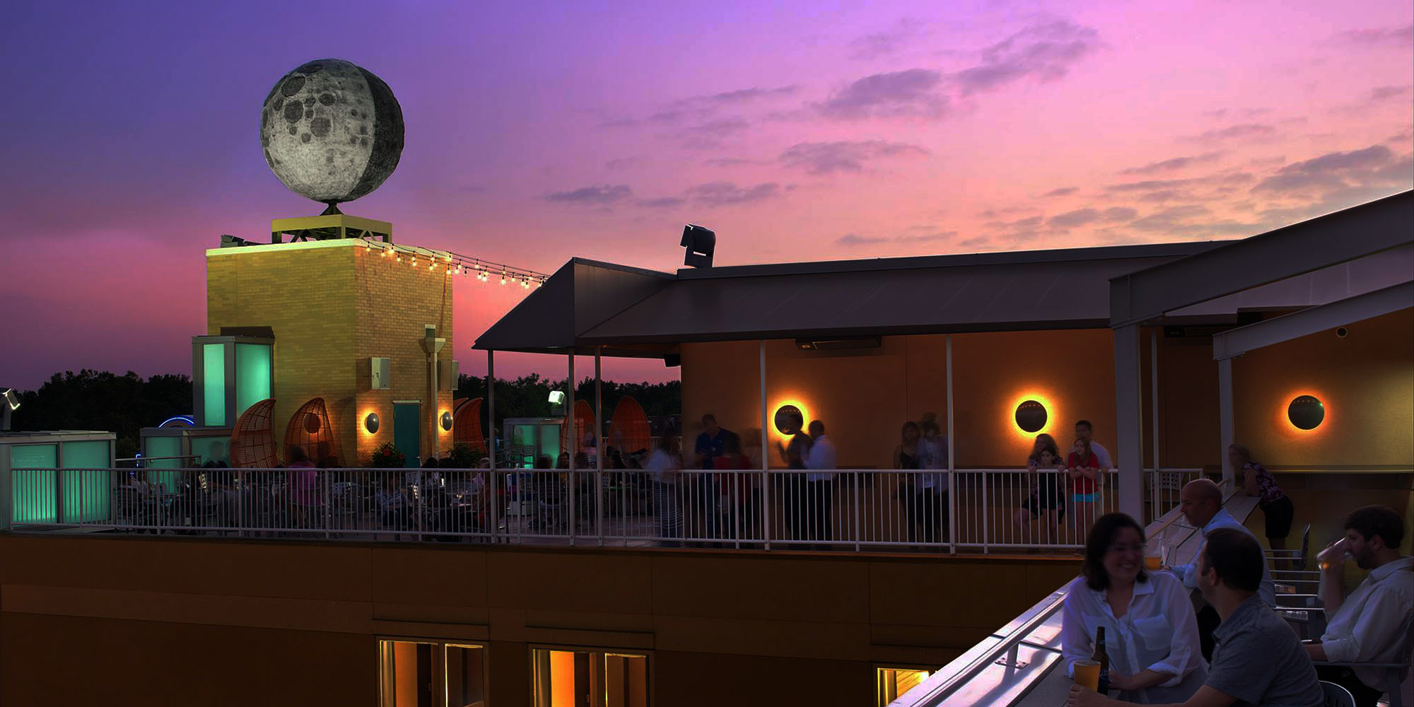 Taking in the harvest moon atop the Moonrise Hotel - The Delmar Loop